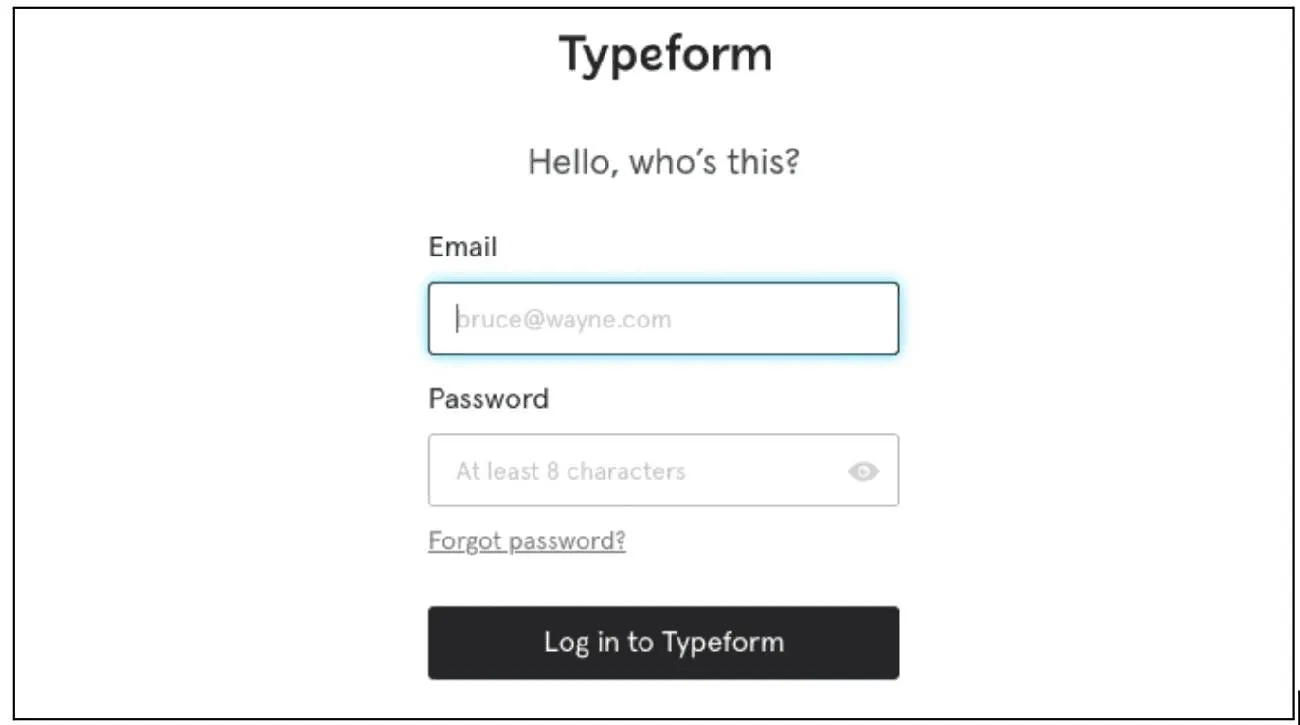 Typeform signup form using fun placeholders like “Bruce Wayne” and playful copy, showing humor in good UX writing examples.