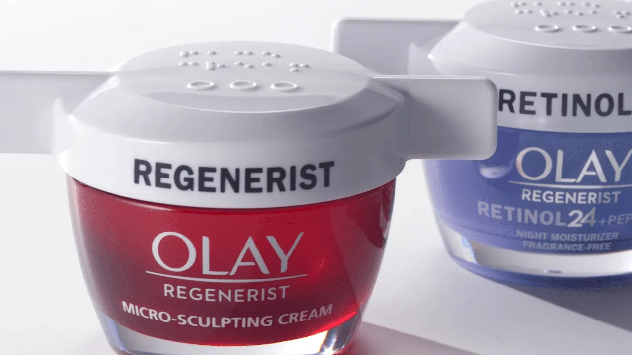 Olay cream jar featuring wide-winged lid designed for dexterity challenges.